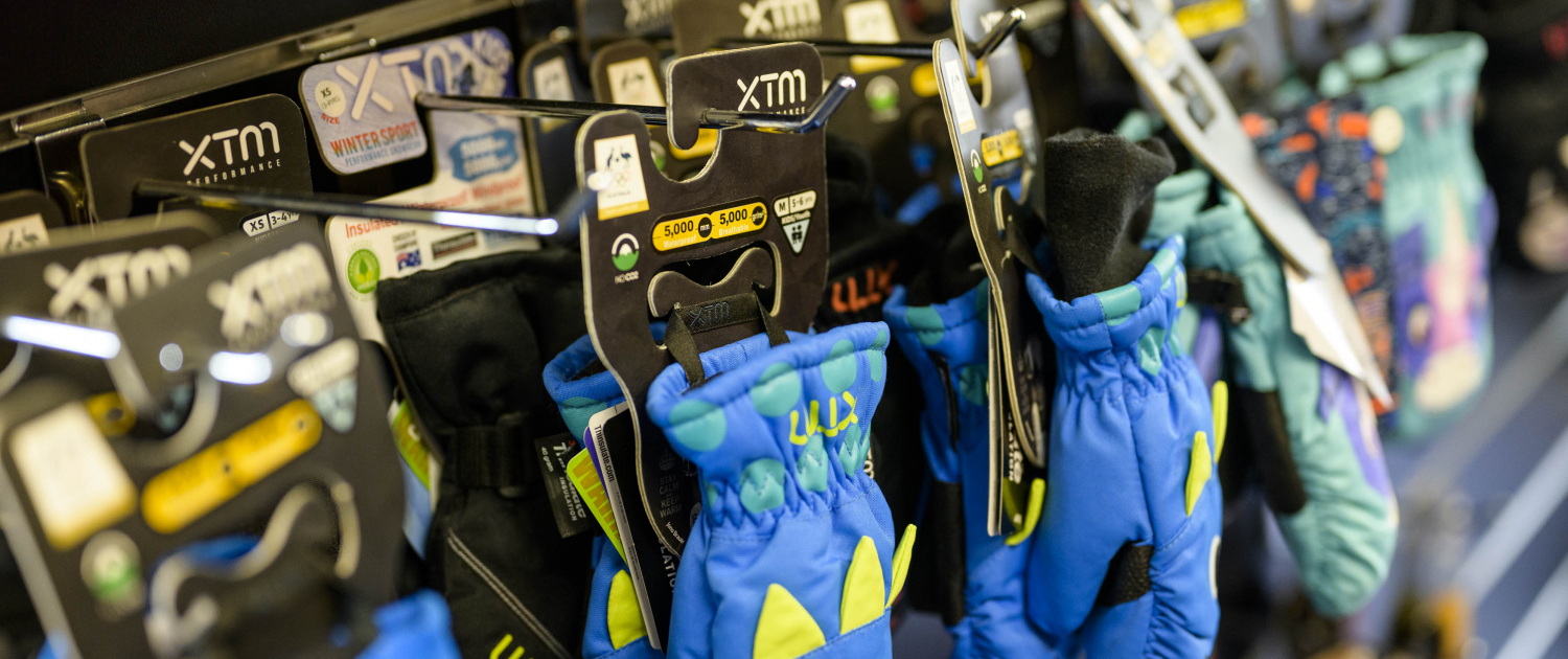 Display of kids gloves for sale at Yogi's Ski & Snowboard Hire